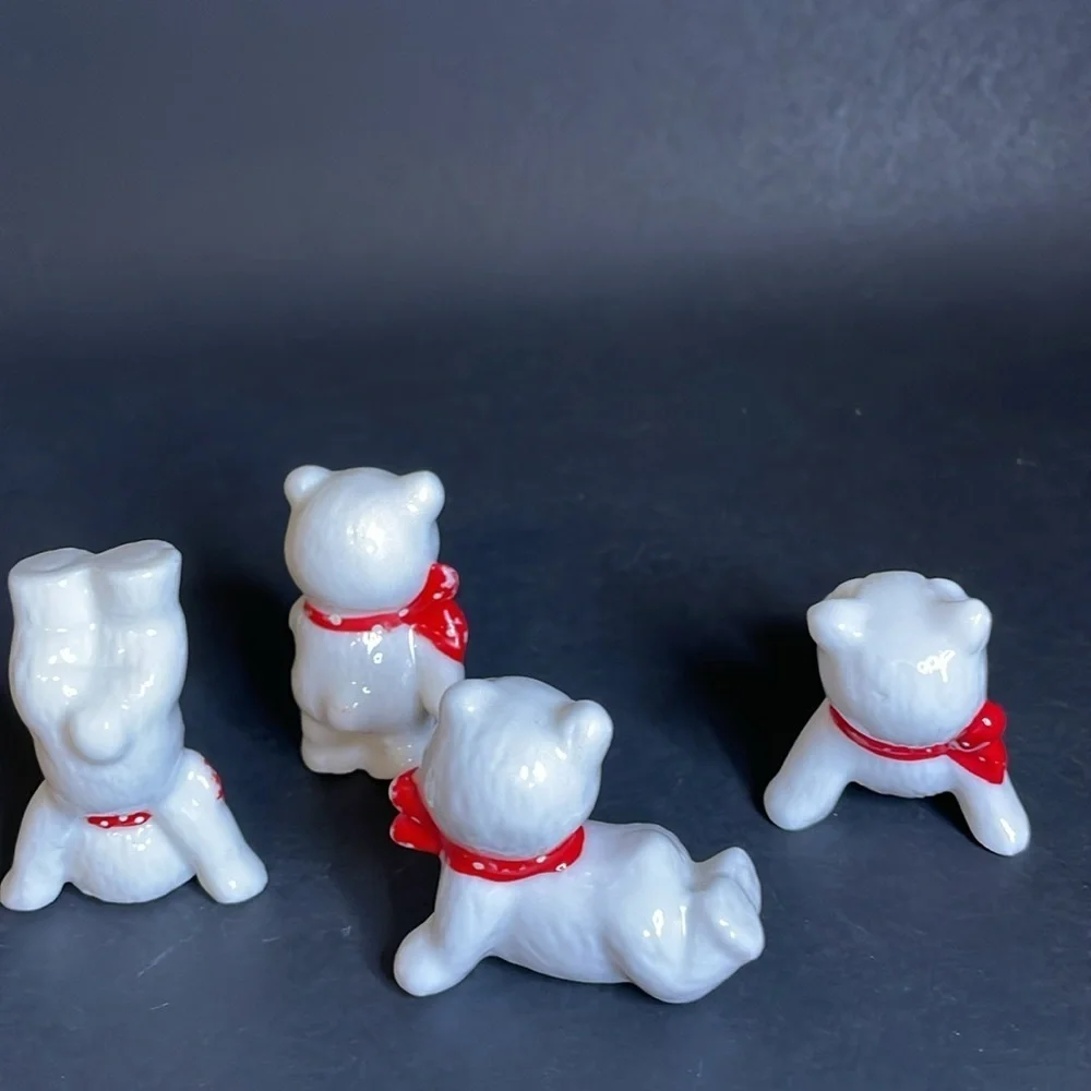 Set‎ of (4) Porcelain/china Posing Polar Bears with Red Bows